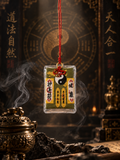 Yellow Chinese talisman charm with yin-yang symbol and red hanging cord